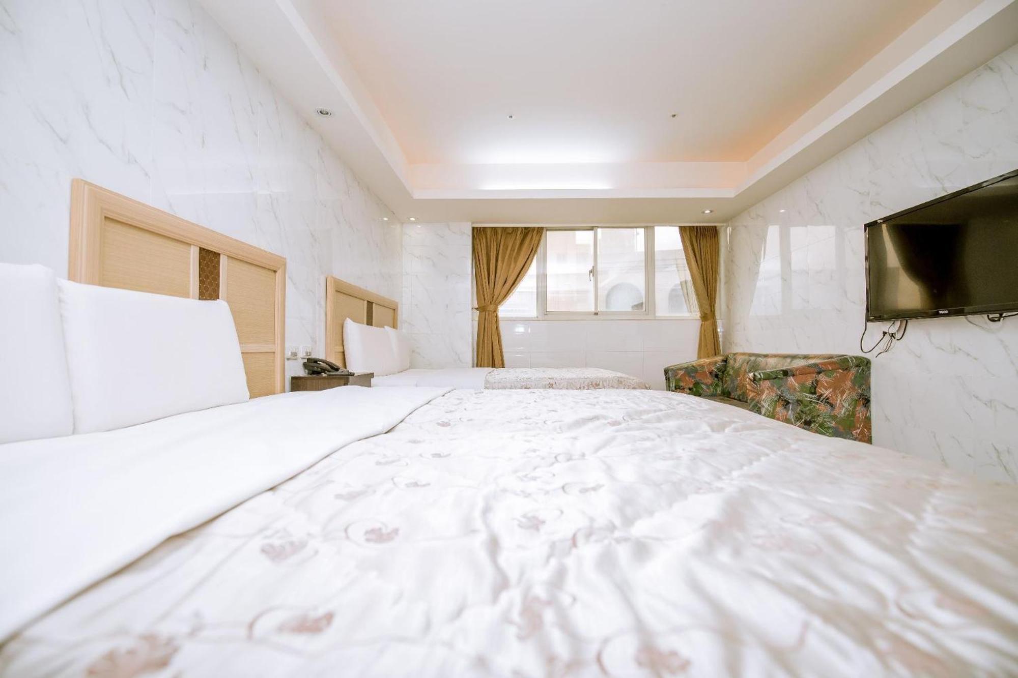 Guide Hotel Taoyuan Fuxing Værelse billede