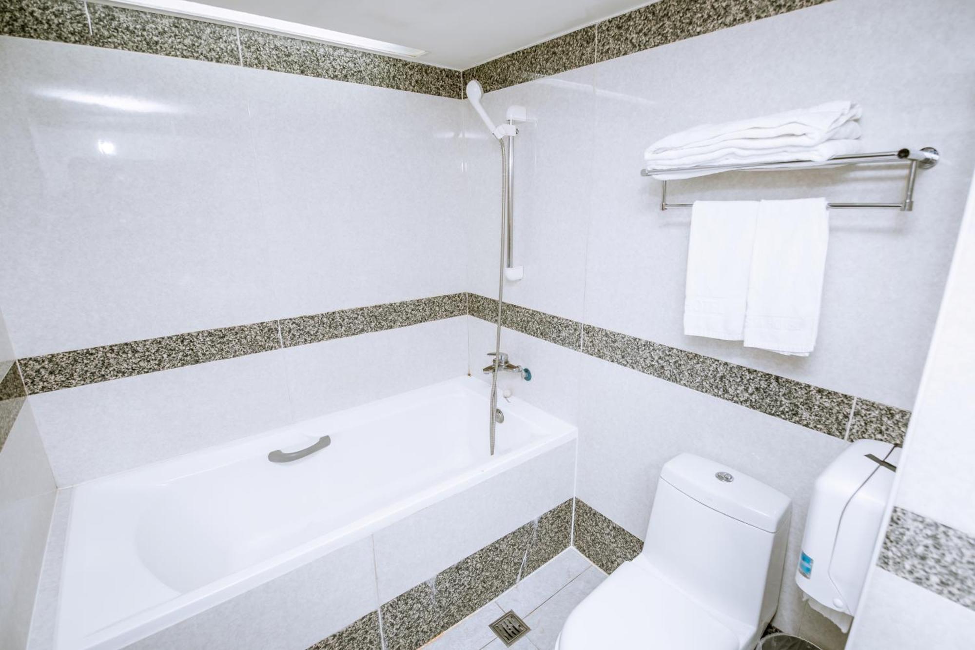 Guide Hotel Taoyuan Fuxing Værelse billede