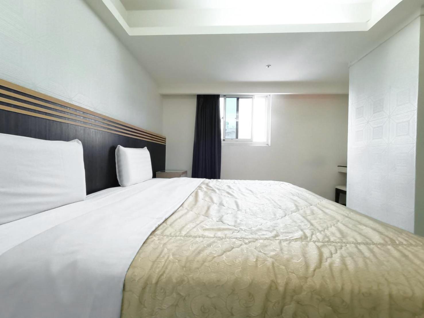Guide Hotel Taoyuan Fuxing Værelse billede